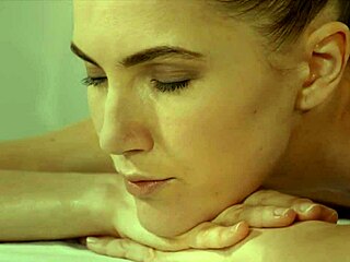 lesbians enjoy an oiled massage session together