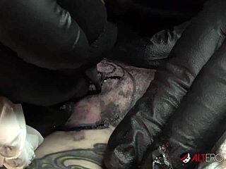 marie bossette endures painful tattoo on her leg.