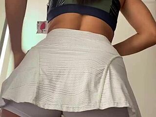 Wife changing clothes in shopping dressing room watch full on red