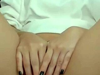 Hot brunette showing her pussy on webcam