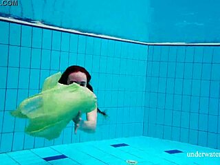 Nina Mohnatka flaunts her hairy pussy on the beach