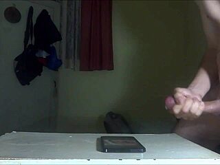 He jerks hard for cassidyboo. Cum lands on her face in this intense scene.