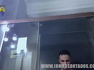 muscular guy in shower with friend.