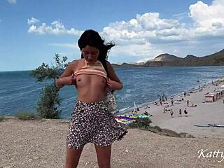 pee in a public place on the background of the beach with people