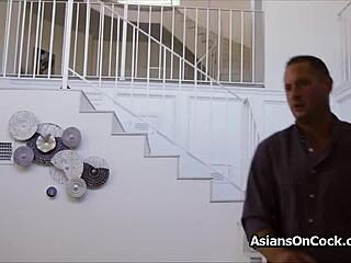 Petite asian coed sucks dicks while on phone