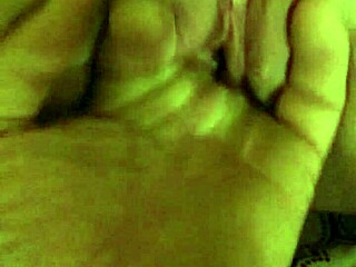 Shy girl with lipslit performs fingering and masturbation on camera, exposing her wet pussy in detailed close-up.