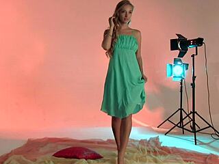 A beautiful model with blonde hair poses naked for a photoshoot