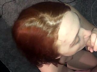 Amateur teen spitting and sucking on cock close up