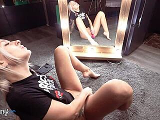 cute young blonde uses vibrator and fingers for orgasm at mirror