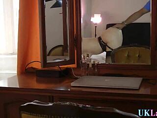 Masturbating mature slut in classy lingerie and stockings.