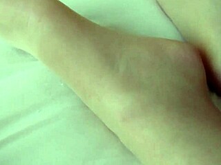 Amateur European BBW slut gets nylon foot massage in bed, toes worshipped.