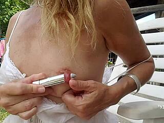 Nippleringlover inserts huge 18mm vibrator in stretched pierced nipples.