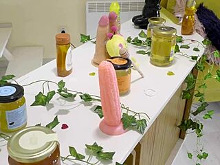 Bonnie Dolce in bee costume licks honey and sucks cocks