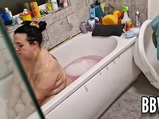 pervert watches bbw wife bathing in the bath.