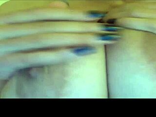 Teen reveals her huge natural tits on webcam