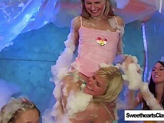 babes turn foam bath into lesbian fucking session