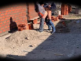 Security camera captures engineer nataly at construction site.