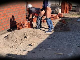 Security camera captures engineer nataly at construction site.