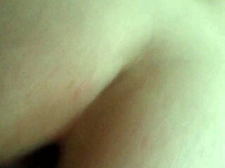 Redhead smokes fucks endowed guy.