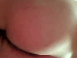 Young guy strokes his cock and displays his ass