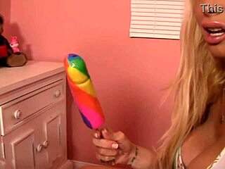 candy manson and cassie laine enjoy hanging out in the pink bedroom together, laughing and chatting casually about their day