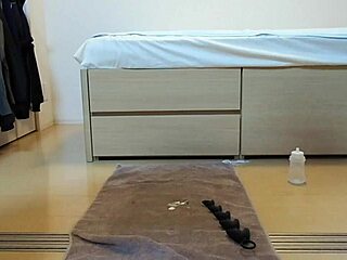 The gay solo performer uses a tulips plug for anal masturbation and assfucking