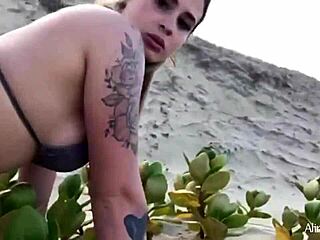 Blonde girl fucks fan on beach