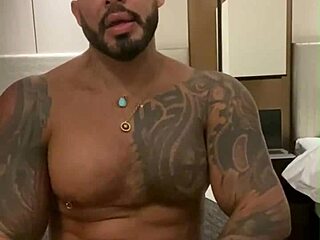 tattooed viktor rom shows off his huge cock in a latino gay solo session