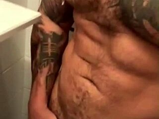 tattooed viktor rom shows off his huge cock in a latino gay solo session