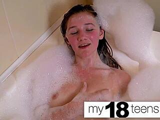 Cute teen 18+ babe masturbates to orgasm in bath closeup