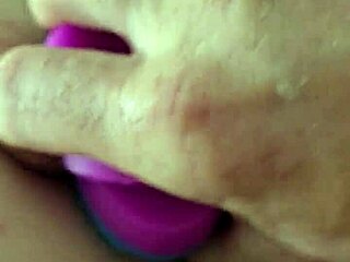 Rainbow dildo used in anal play