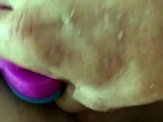 Rainbow dildo used in anal play