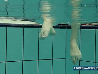 Katya Okuneva Stuns in Red Dress by the Pool. Her Solo Show Heats Up Outdoors.