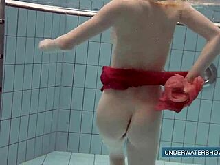 Katya Okuneva Stuns in Red Dress by the Pool. Her Solo Show Heats Up Outdoors.