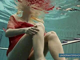 Katya Okuneva Stuns in Red Dress by the Pool. Her Solo Show Heats Up Outdoors.