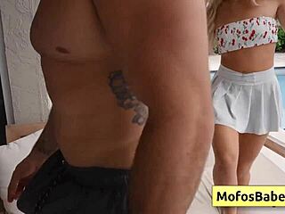 Emma Bugg, petite naughty blonde teen 18+, slurps JMac’s huge dick poolside