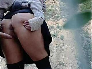 hot woman enjoys outdoor activity with partner