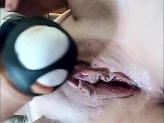 Is the large thick dildo making her pussy wet and dripping while clothes rip?