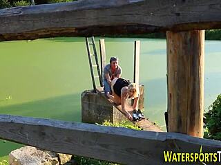 weird slut fucking peeing with monster cock and golden shower outdoor