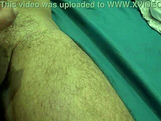 Hairy Amateur Stepmom Gives Handjob to 18-Year-Old Stepson in Bedroom, Making Him Cum