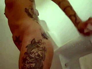 Emy Angel takes a steamy hot shower with herself