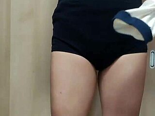 Teen Amateur in Gym Costume Blushes with Buttplug and Pierced Nipples