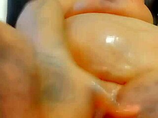 look at this chubby babe with big natural tits getting oiled up and ready for some fun