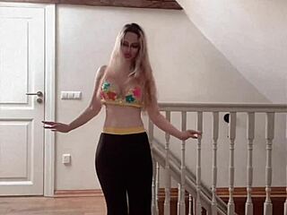 Belly dancer goddess with glasses sways to seductive music rhythmically