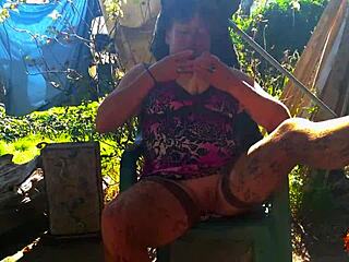 Klaudiaambergirl's solo outdoor masturbation features big natural tits in stockings