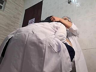 Naughty nurse gives doctor intimate exam in hospital bathroom