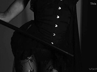 Horny Ebony Witch Teases with Double Cane Insertion