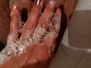 Hot Stepbrother in Shower Gets Handjob