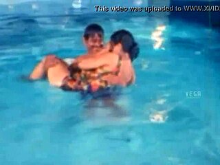unmarried hot couple enjoys swim pool fun