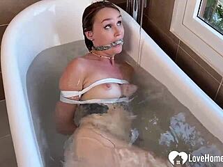 Brunette Tied in Bathtub